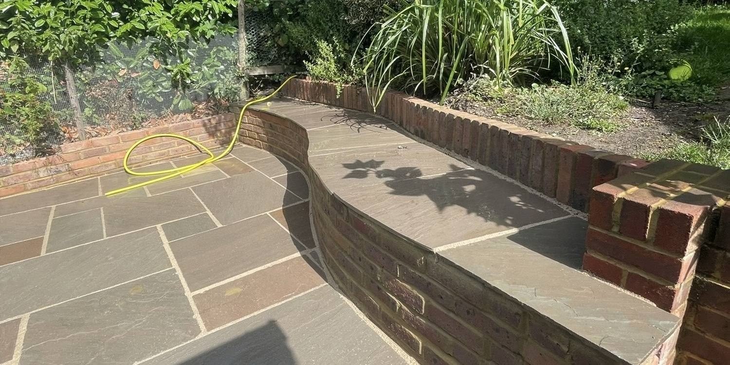 Walls by Solid Driveways and Landscaping